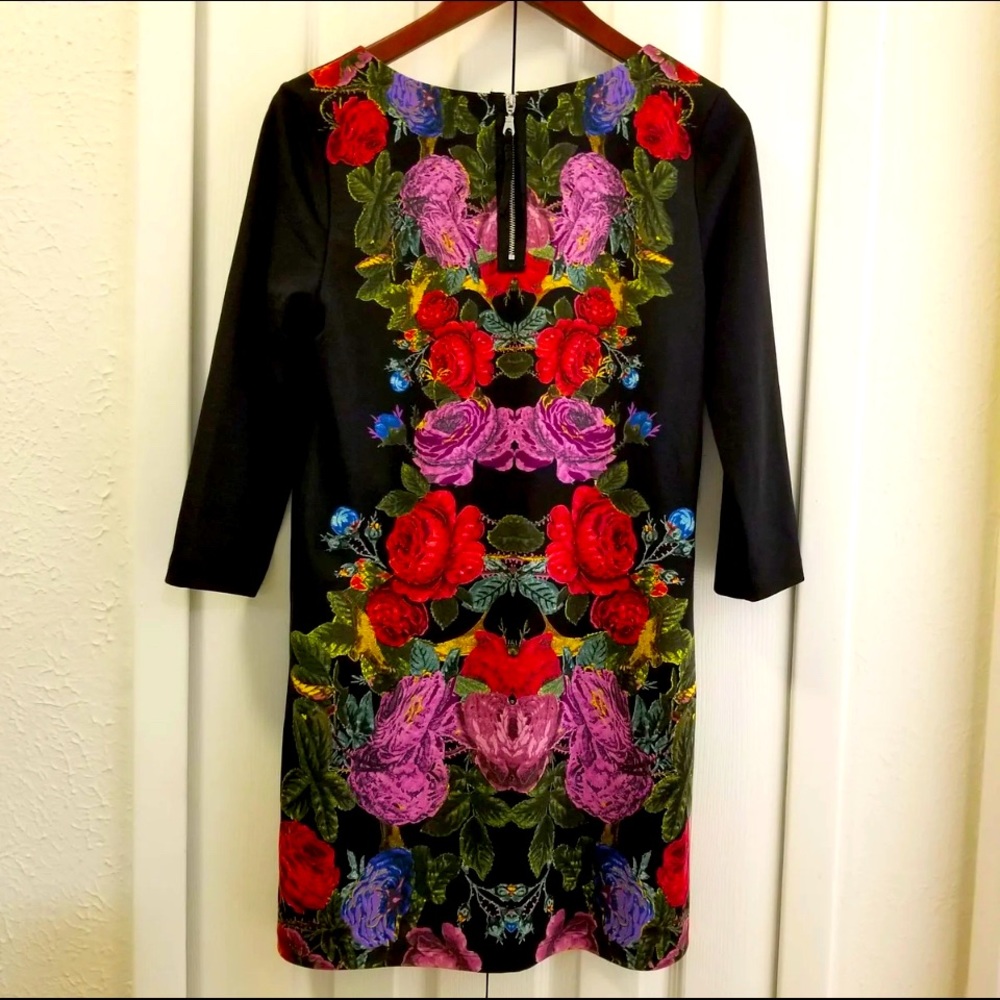 H&M dress, features a bold colorful floral design w zipper back - size Large